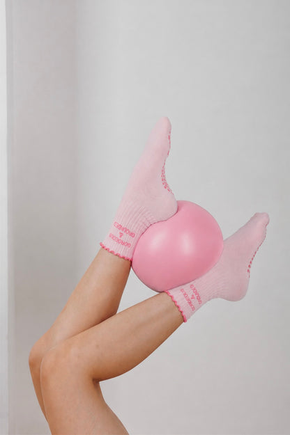 Pinke Pilates Socken mit Ball